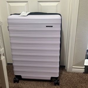 Brand new never used large Calpak 26.5”